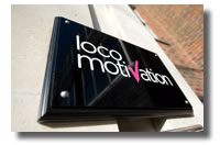 image of locomotivation sign outside building