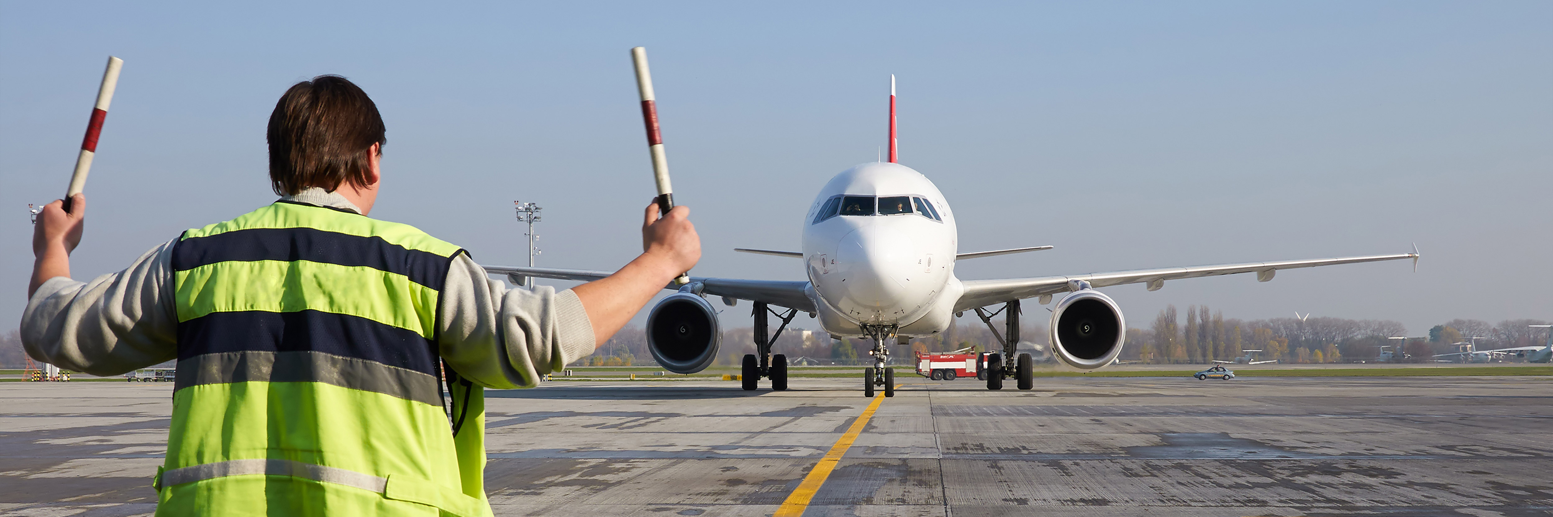 a landscapre picture of an airport and runway